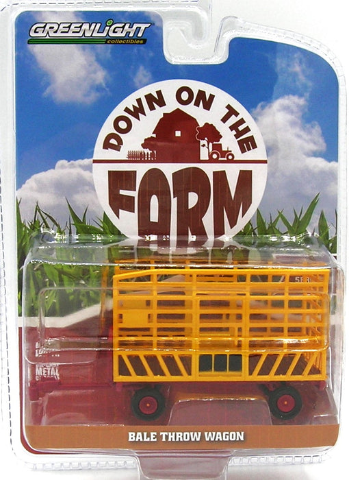 1/64 GREENLIGHT TOY BALE THROW WAGON YELLOW/RED